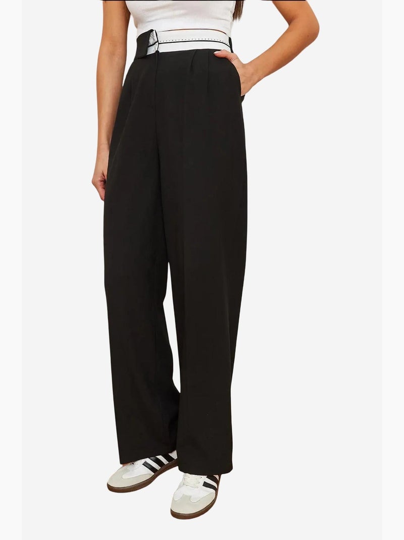 Pantaloni palazzo asimmetrici con vita a gamba larga e bottoni lucci Nero - Kiabi