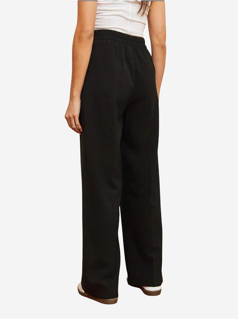 Pantaloni palazzo asimmetrici con vita a gamba larga e bottoni lucci Nero - Kiabi