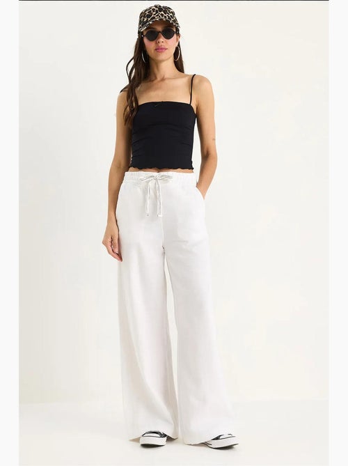 Pantaloni palazzo con vita elasticizzata lucci - Kiabi Pantaloni palazzo con vita elasticizzata lucci - Kiabi