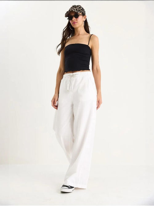 Pantaloni palazzo con vita elasticizzata lucci - Kiabi Pantaloni palazzo con vita elasticizzata lucci - Kiabi