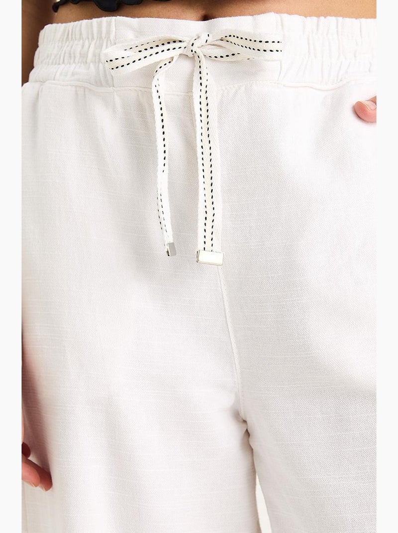 Pantaloni palazzo con vita elasticizzata lucci Bianco - Kiabi