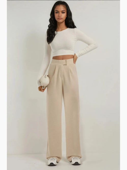 Pantaloni palazzo in crêpe con vita alta elasticizzata hiccup - Kiabi Pantaloni palazzo in crêpe con vita alta elasticizzata hiccup - Kiabi