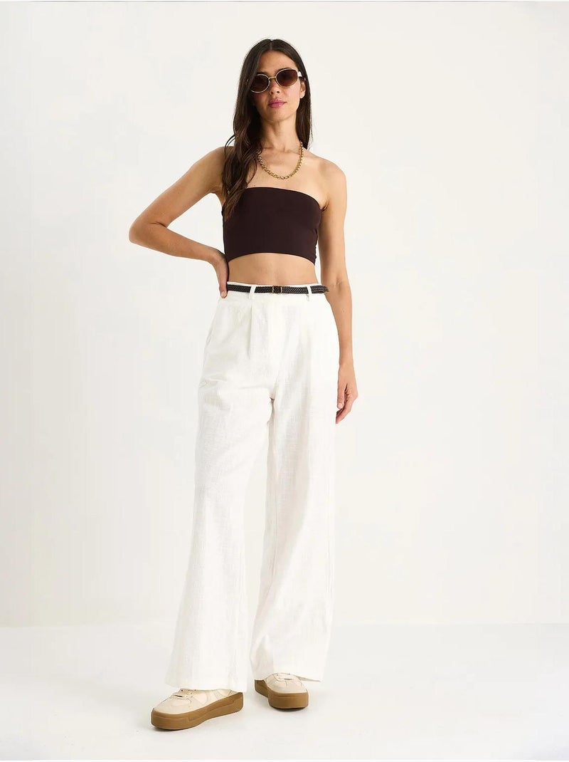 Pantaloni palazzo in lino con cintura in paglia e dettaglio tasca lucci Bianco - Kiabi