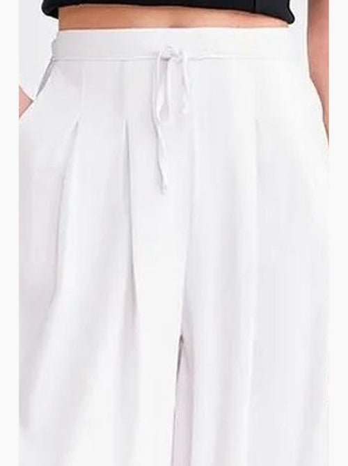 Pantaloni palazzo plissettati a vita alta mixray - Kiabi Pantaloni palazzo plissettati a vita alta mixray - Kiabi