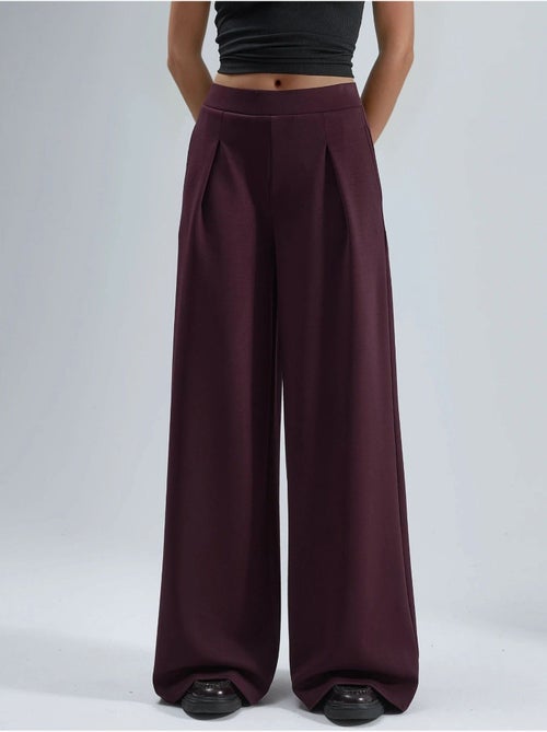 Pantaloni palazzo plissettati con vita elasticizzata busem - Kiabi Pantaloni palazzo plissettati con vita elasticizzata busem - Kiabi