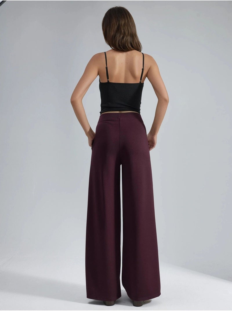 Pantaloni palazzo plissettati con vita elasticizzata busem Rosso bordeaux - Kiabi
