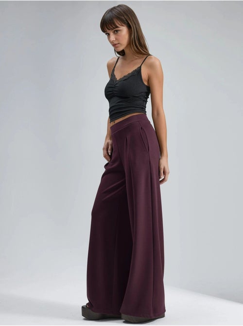 Pantaloni palazzo plissettati con vita elasticizzata busem - Kiabi Pantaloni palazzo plissettati con vita elasticizzata busem - Kiabi