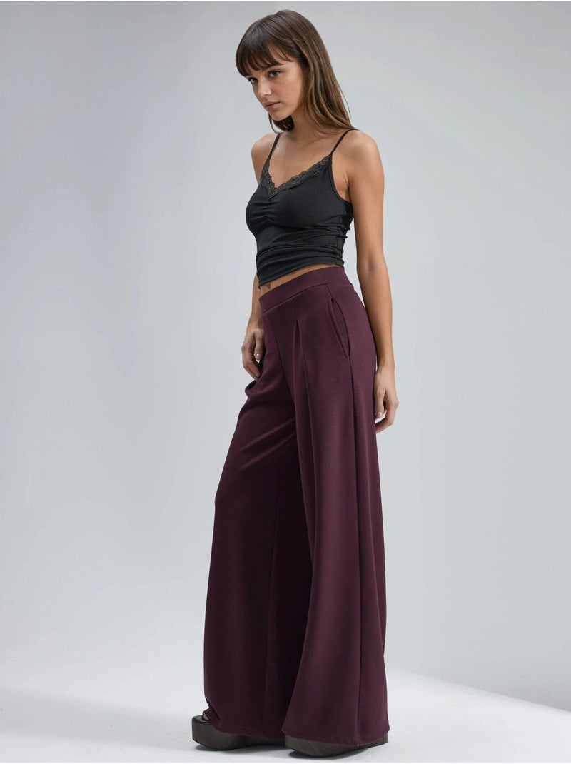 Pantaloni palazzo plissettati con vita elasticizzata busem Rosso bordeaux - Kiabi