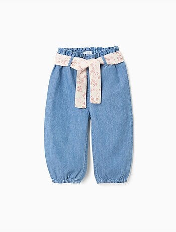 Pantaloni paperbag in denim con cintura floreale