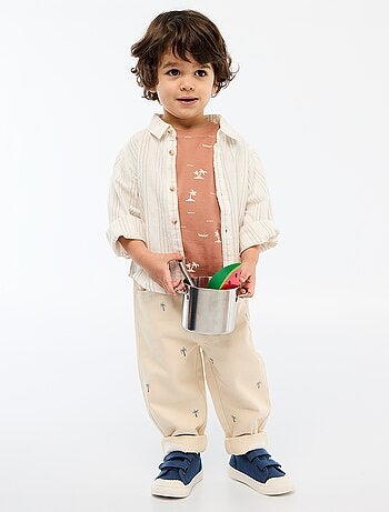 Pantaloni paperbag ricamati all-over in twill di cotone