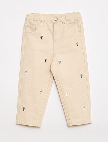 Pantaloni paperbag ricamati all-over in twill di cotone