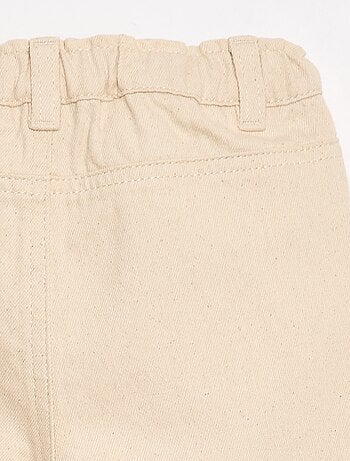 Pantaloni paperbag ricamati all-over in twill di cotone