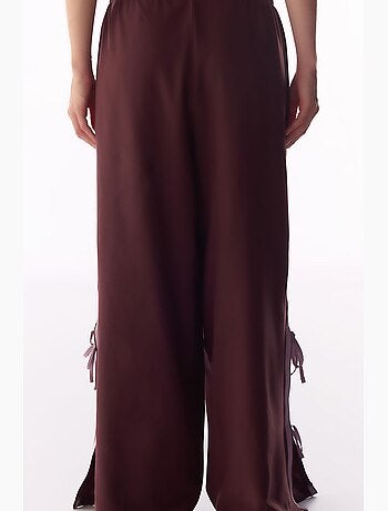 Pantaloni parachute a gamba larga con dettaglio fiocco penti