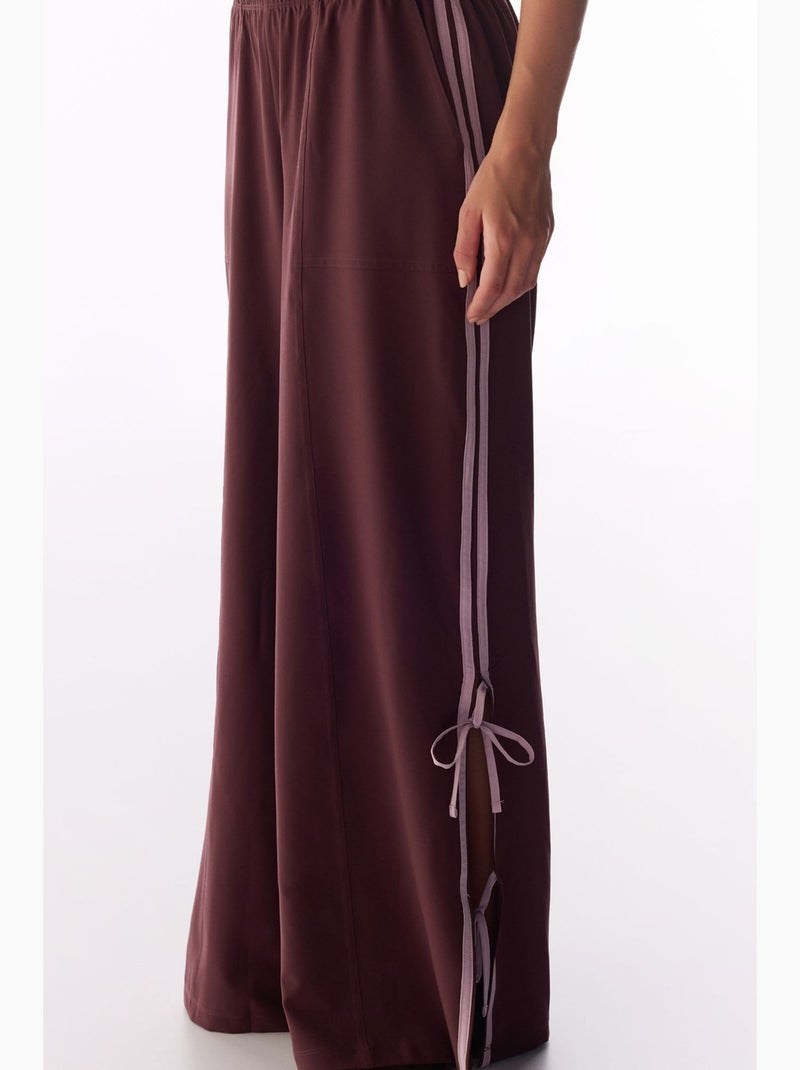 Pantaloni parachute a gamba larga con dettaglio fiocco penti Rosso bordeaux - Kiabi