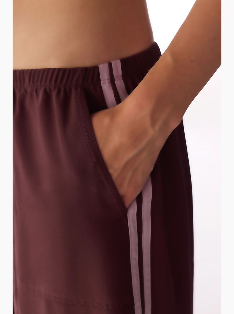 Pantaloni parachute a gamba larga con dettaglio fiocco penti Rosso bordeaux - Kiabi