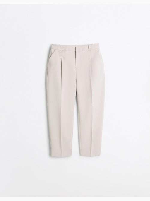 Pantaloni piegati, mo fashion - Kiabi Pantaloni piegati, mo fashion - Kiabi