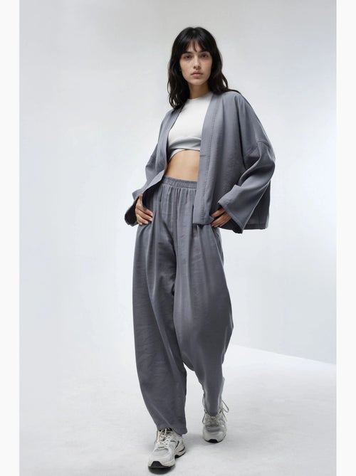 Pantaloni plissettati a gamba ampia busem - Kiabi Pantaloni plissettati a gamba ampia busem - Kiabi