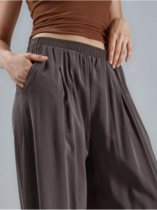Pantaloni plissettati a gamba ampia busem - Kiabi Pantaloni plissettati a gamba ampia busem - Kiabi