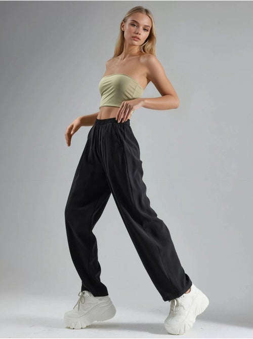 Pantaloni plissettati a gamba ampia busem - Kiabi Pantaloni plissettati a gamba ampia busem - Kiabi