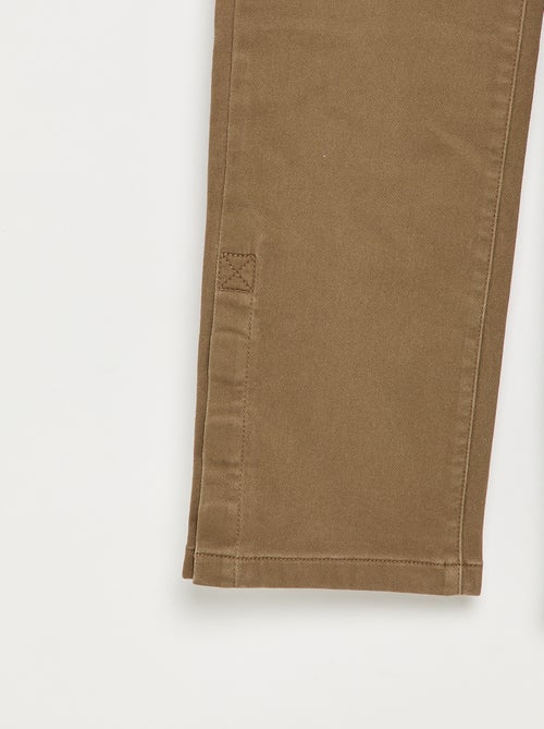 Pantaloni regular con tasche a patta - collezione facile da indossare - Kiabi Pantaloni regular con tasche a patta - collezione facile da indossare - Kiabi