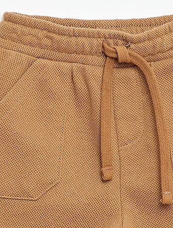Pantaloni relax in maglia piqué