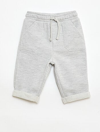 Pantaloni relax in maglia piqué