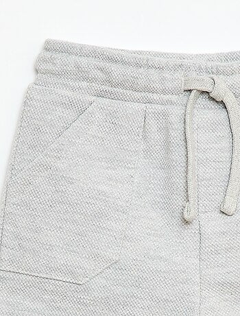 Pantaloni relax in maglia piqué