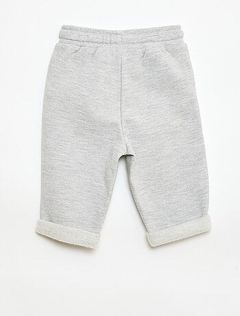 Pantaloni relax in maglia piqué