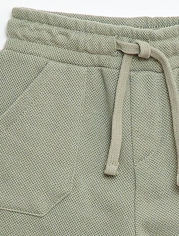 Pantaloni relax in maglia piqué