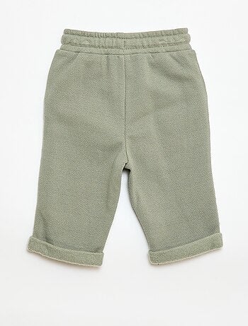 Pantaloni relax in maglia piqué