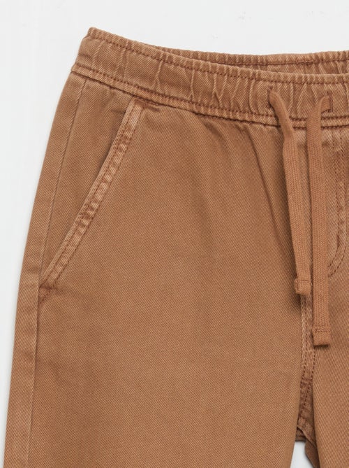 Pantaloni relaxed fit con vita elasticizzata - Kiabi Pantaloni relaxed fit con vita elasticizzata - Kiabi