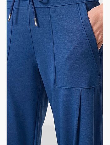 Pantaloni relaxed in crêpe a vita media con tasca tommy