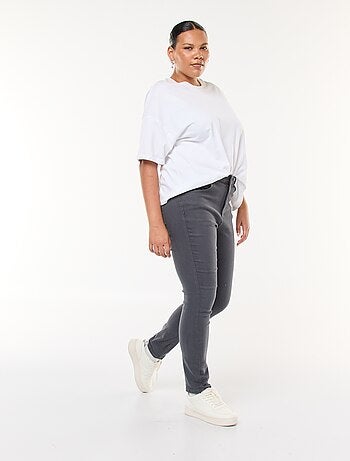 Pantaloni skinny a vita alta
