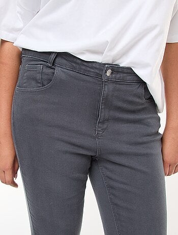 Pantaloni skinny a vita alta