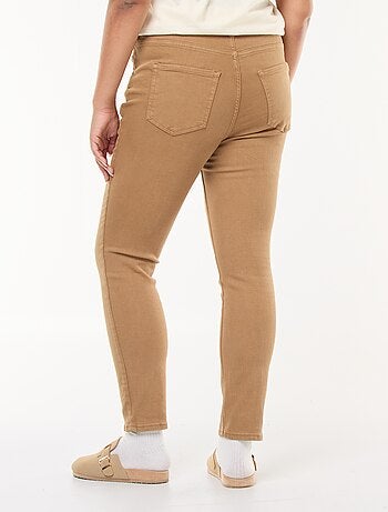 Pantaloni skinny a vita alta