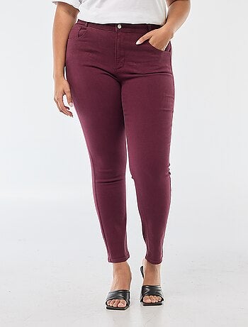 Pantaloni skinny a vita alta