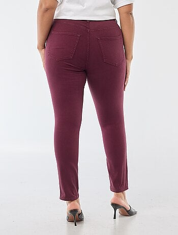 Pantaloni skinny a vita alta