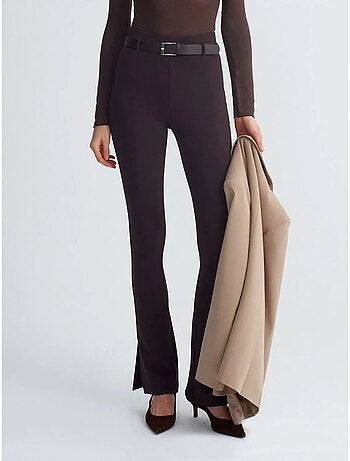 Pantaloni skinny a zampa con cintura