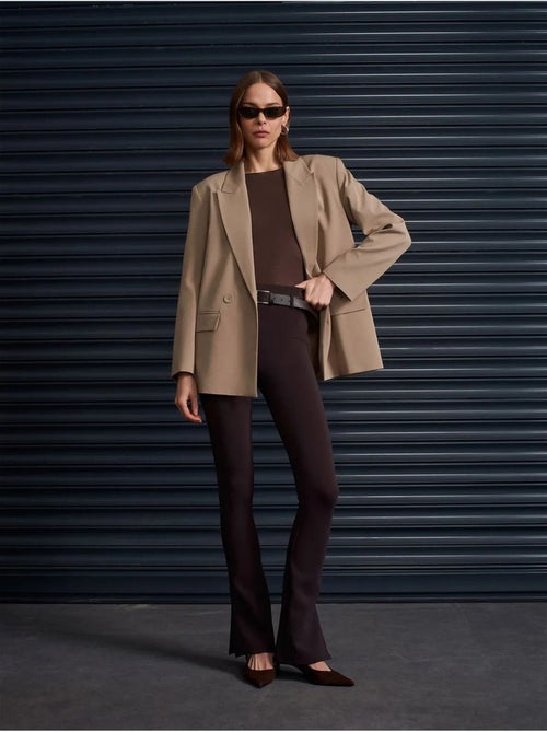 Pantaloni skinny a zampa con cintura - Kiabi Pantaloni skinny a zampa con cintura - Kiabi