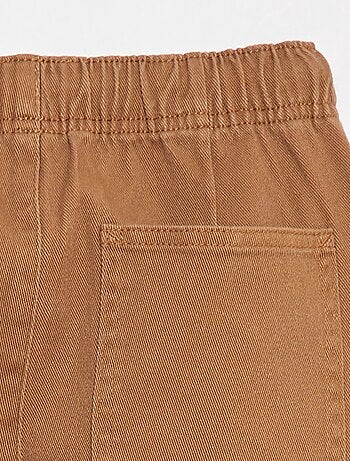 Pantaloni slim con vita regolabile