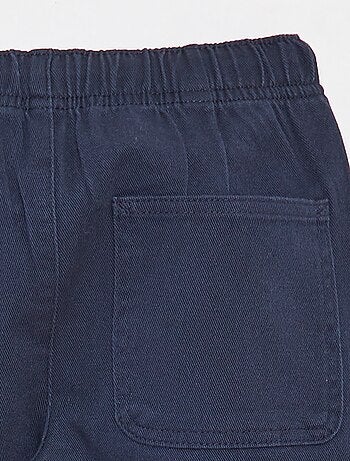Pantaloni slim con vita regolabile