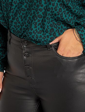 Pantaloni spalmati