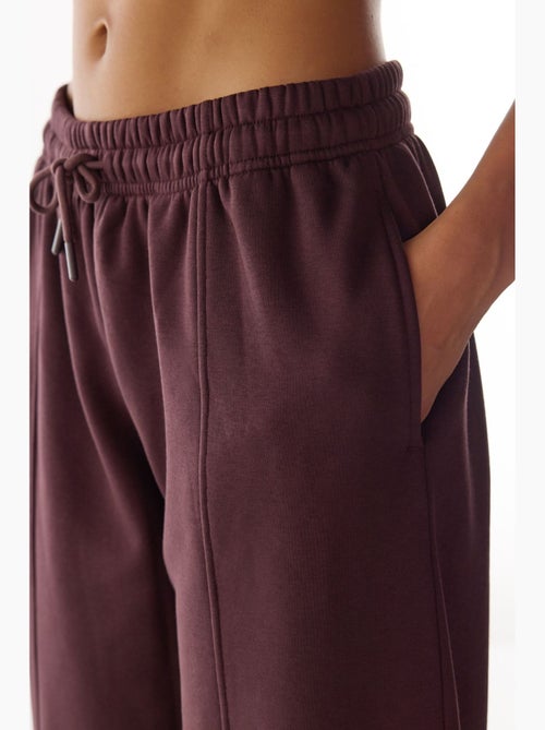 Pantaloni sportivi con dettagli cuciture e taglio balloon felpati penti - Kiabi Pantaloni sportivi con dettagli cuciture e taglio balloon felpati penti - Kiabi