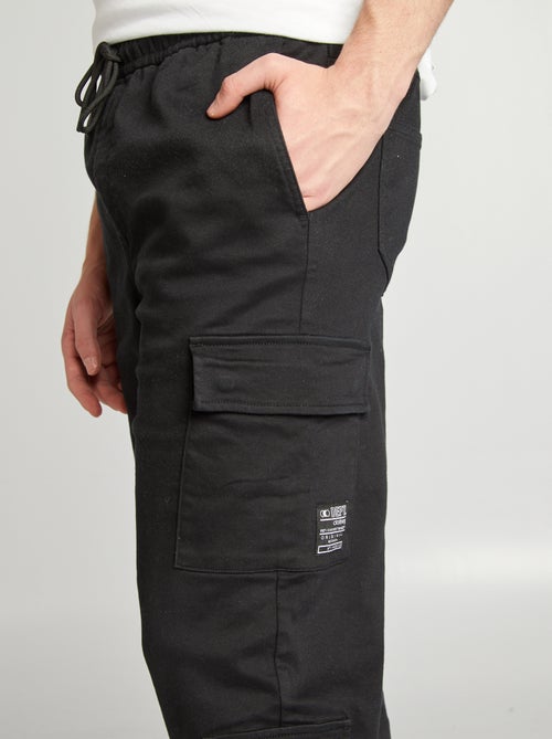 Pantaloni stile 'jogger' multitasche - Kiabi