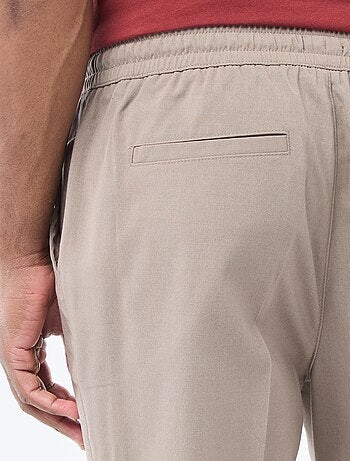 Pantaloni stile 'jogger' tinta unita