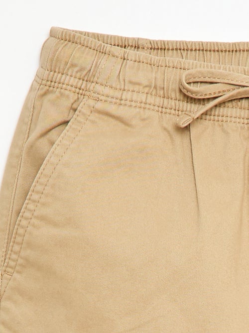 Pantaloni stretch tinta unita multitasche - Kiabi