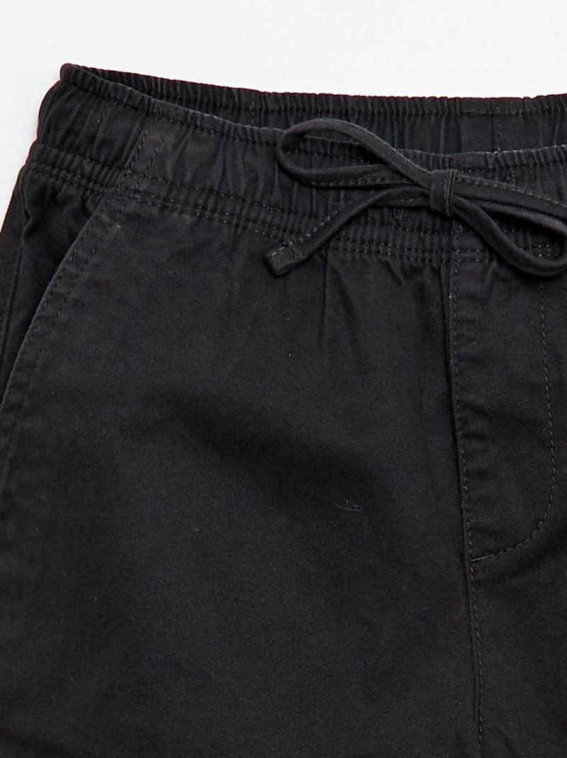 Pantaloni stretch tinta unita multitasche Nero - Kiabi
