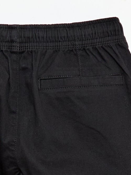 Pantaloni stretch tinta unita multitasche - Kiabi