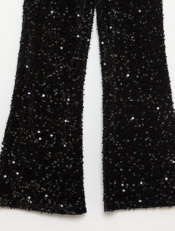 Pantaloni svasati lucidi