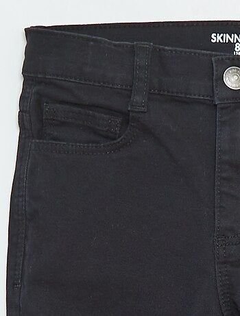 Pantaloni taglio skinny / modello molto aderente a 5 tasche